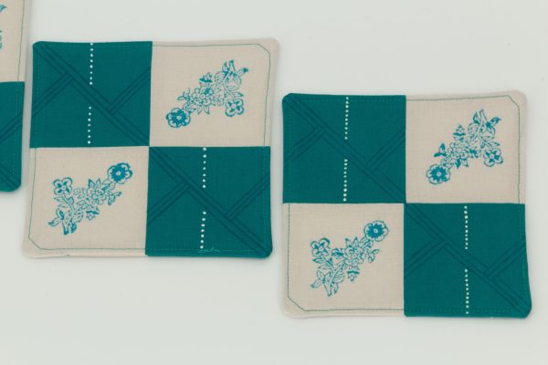 Close-up of two coasters