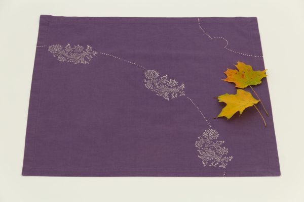 A single napkin with two maple leaves