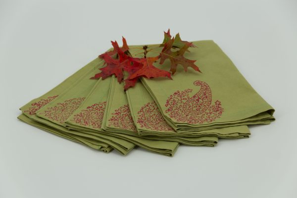 Six folded napkins with an oak leaf cluster